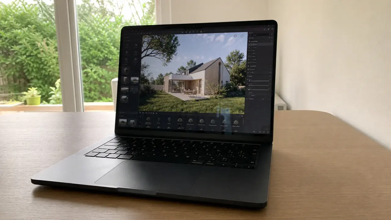 Portátil con Twinmotion mostrando la visualización de un proyecto residencial